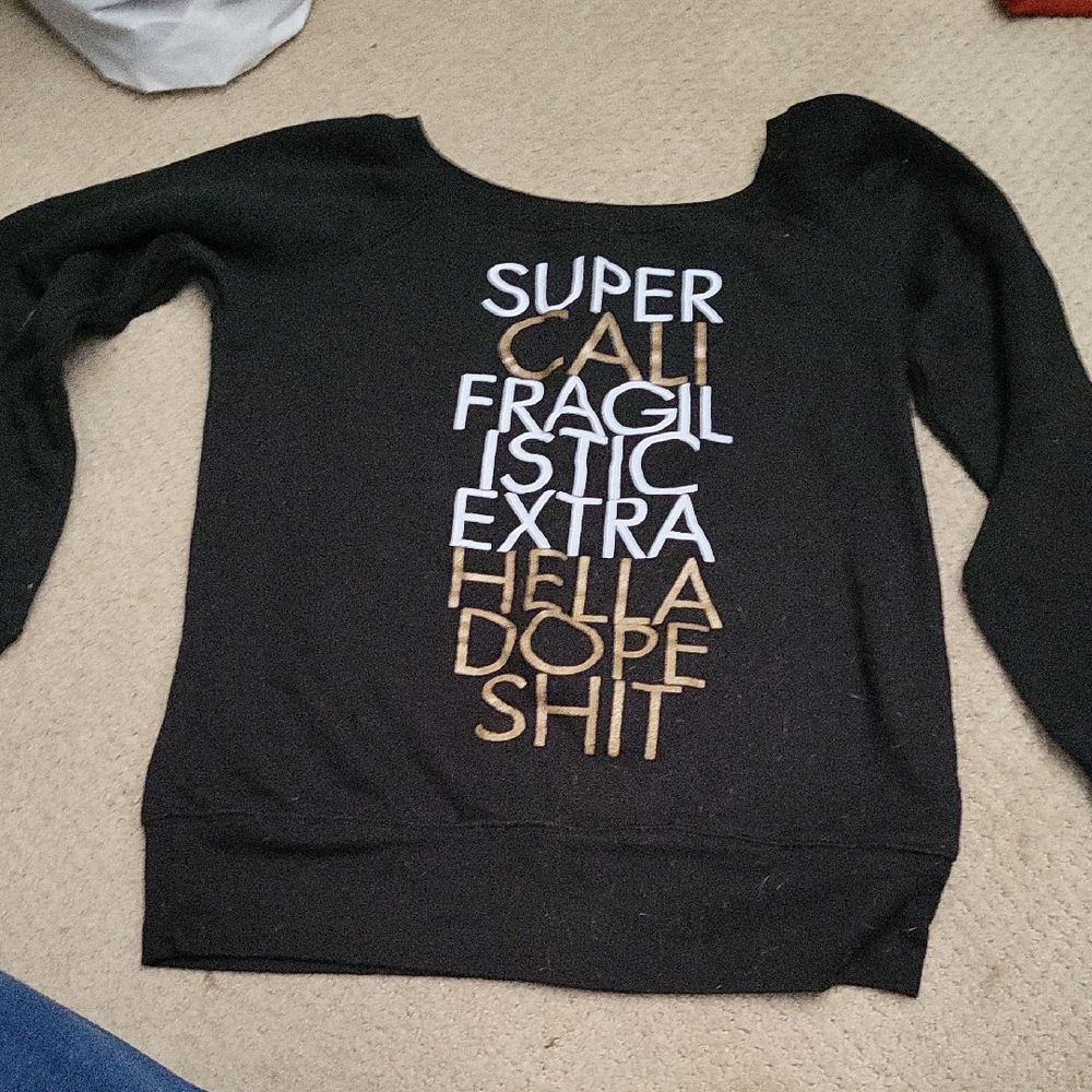 Chic Black Sweater with Gold and White Graphic